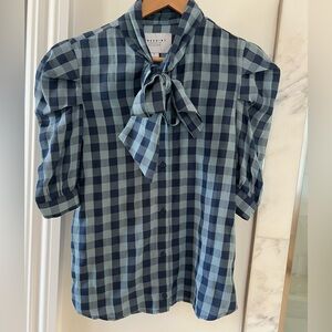 Blue gingham puff sleeve blouse with neck tie